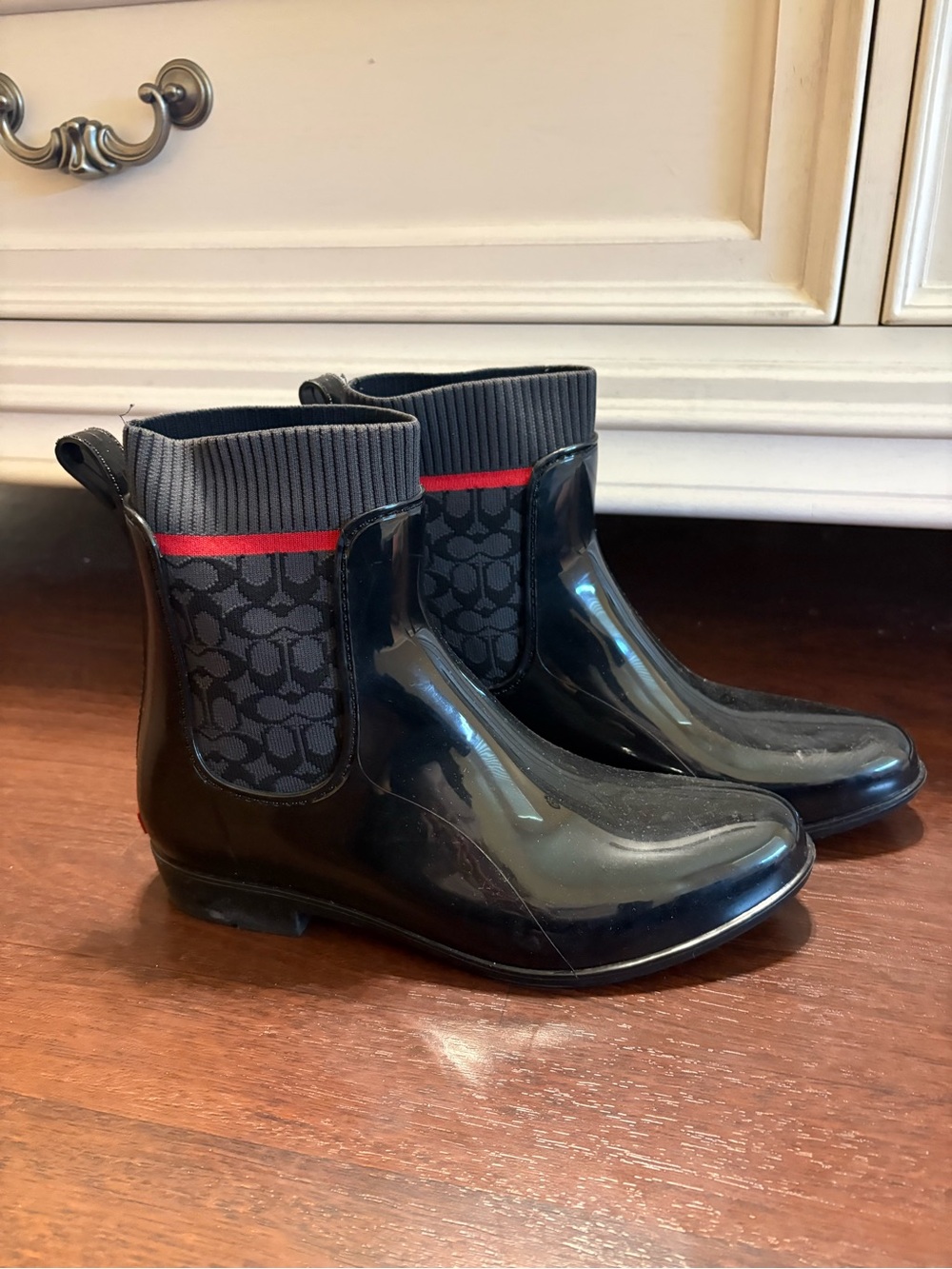 Coach Black Rain Chelsea Boots with Red Accent